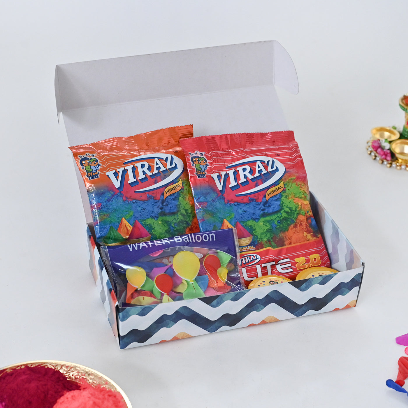 Holi Gift Hamper Herbal Gulal, Chandan, Deluxe Water Balloons Holi Gift Box