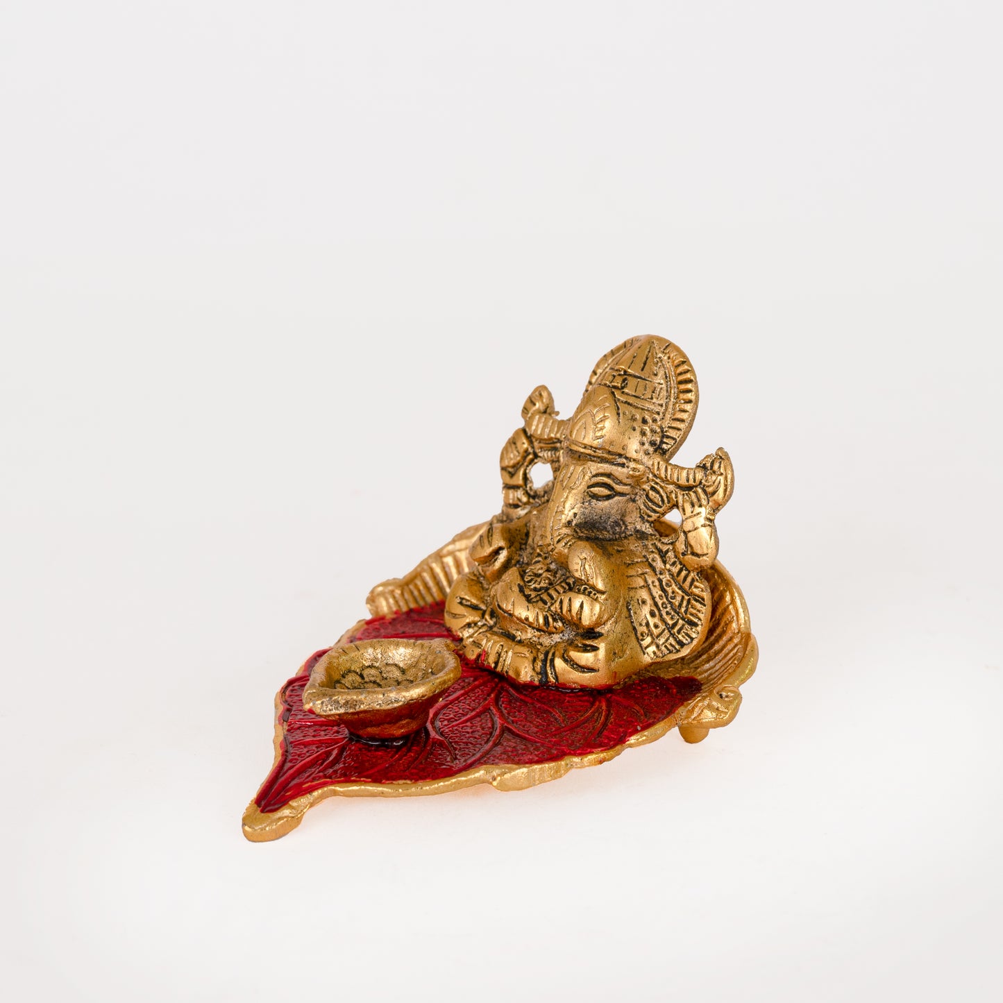 Ganesh Idol on Leaf - Lord Ganesha with Diya