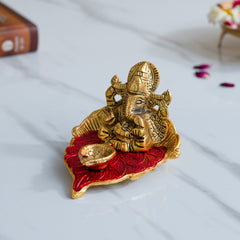 Ganesh Idol on Leaf - Lord Ganesha with Diya