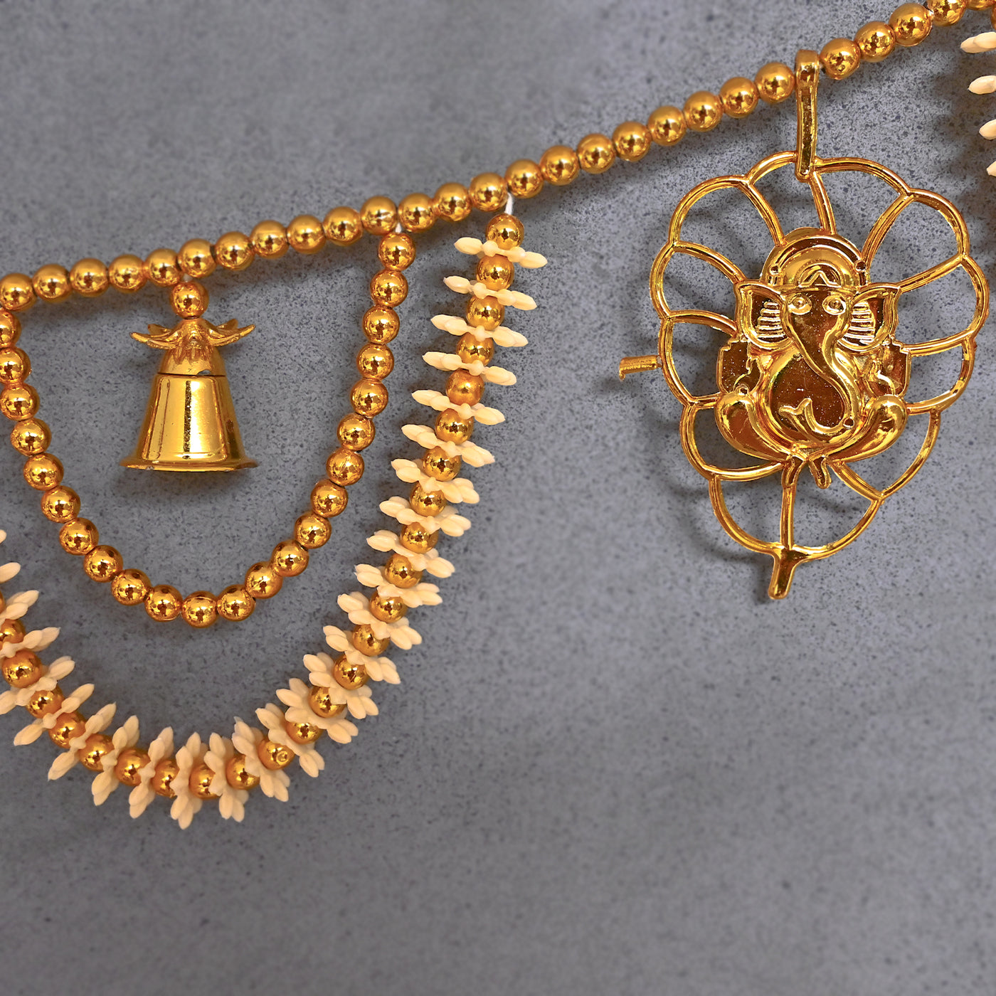 Decorative Hand-Woven Flower Toran with Bell and Lord Ganesha