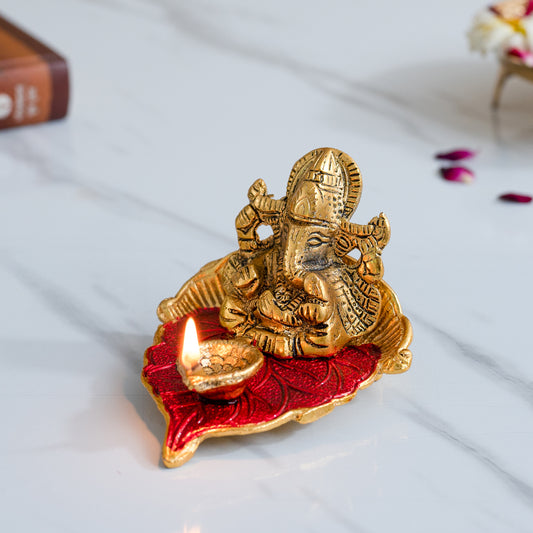 Ganesh Idol on Leaf - Lord Ganesha with Diya