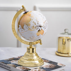 White and Gold Globe on Brass Stand