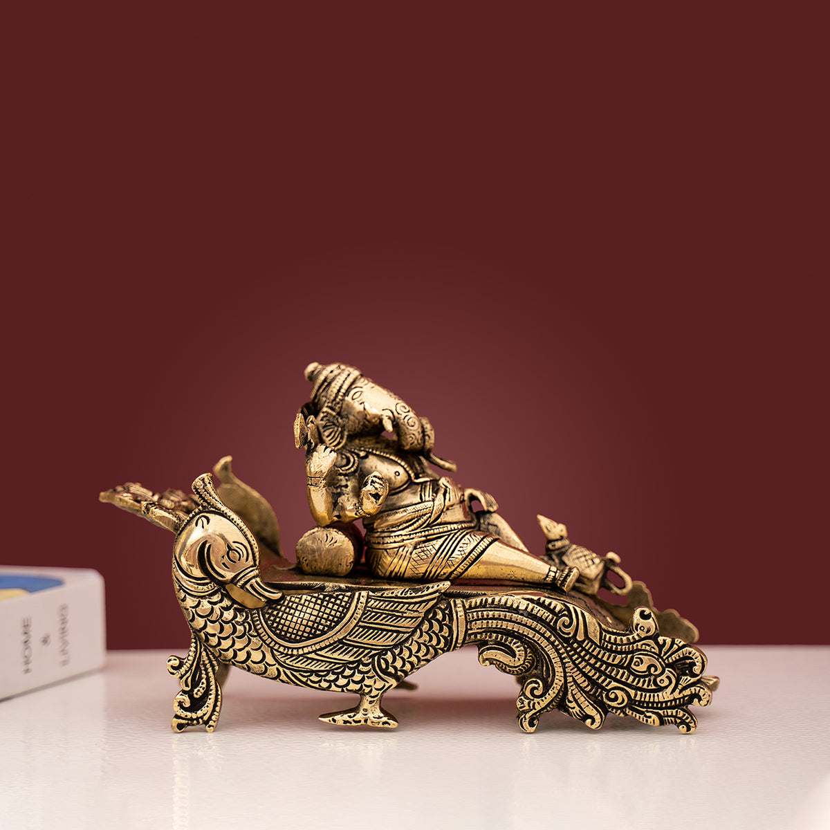 Brass Sofa Ganesha- Lord Ganesha Resting On Peacock Couch