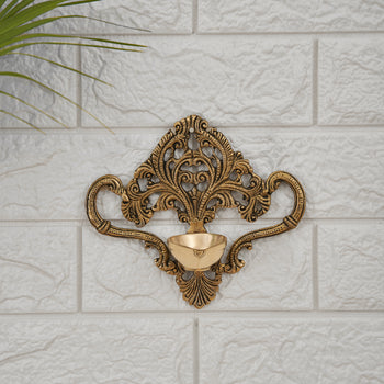 Bani Brass Wall Diya In Antique Finish